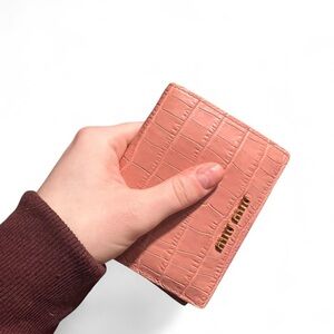Pink crocodile leather Miu Miu bifold wallet